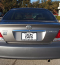 toyota camry 2005 gray sedan le gasoline 4 cylinders front wheel drive automatic with overdrive 76011