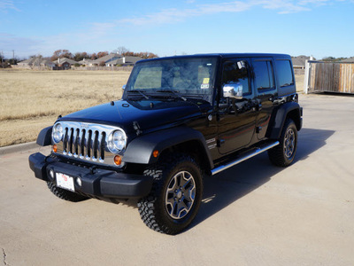 jeep wrangler unlimited 2012 black suv sport gasoline 6 cylinders 4 wheel drive automatic 76049