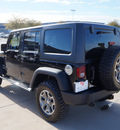 jeep wrangler unlimited 2012 black suv sport gasoline 6 cylinders 4 wheel drive automatic 76049