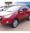 hyundai tucson 2013 dk  red limited gasoline 4 cylinders front wheel drive automatic 77074