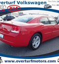 dodge charger 2009 red sedan r t gasoline 8 cylinders rear wheel drive automatic 99336