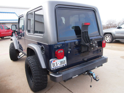 jeep wrangler 2005 blue suv unlimited gasoline 6 cylinders 4 wheel drive 6 speed manual 76018