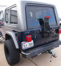 jeep wrangler 2005 blue suv unlimited gasoline 6 cylinders 4 wheel drive 6 speed manual 76018