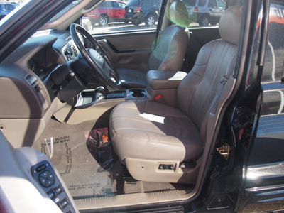 jeep grand cherokee 2004 black suv laredo gasoline 6 cylinders 4 wheel drive automatic 79110