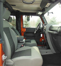 jeep wrangler 2010 orange suv sport gasoline 6 cylinders 4 wheel drive automatic 56001