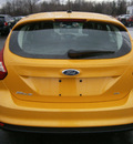 ford focus 2012 yellow hatchback se flex fuel 4 cylinders front wheel drive 5 speed manual 13502