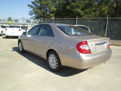 toyota camry 2004 tan sedan xle gasoline 4 cylinders front wheel drive automatic 75503