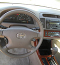 toyota camry 2004 tan sedan xle gasoline 4 cylinders front wheel drive automatic 75503