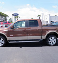 ford f 150 2012 brown lariat gasoline 6 cylinders 4 wheel drive automatic 32401