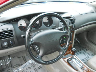 suzuki verona 2004 maroon sedan ex gasoline 6 cylinders front wheel drive automatic 99208