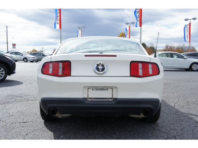 ford mustang 2011 white coupe v6 premium gasoline 6 cylinders rear wheel drive automatic 28677