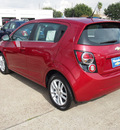 chevrolet sonic 2013 red hatchback lt auto gasoline 4 cylinders front wheel drive automatic 77090