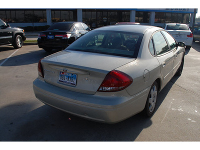 ford taurus 2007 gold sedan se gasoline 6 cylinders front wheel drive 4 speed automatic 77090