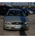 ford taurus 2007 gold sedan se gasoline 6 cylinders front wheel drive 4 speed automatic 77090