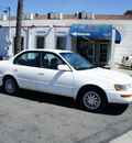 toyota corolla 1997 white sedan dx gasoline 4 cylinders front wheel drive automatic 92882