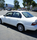 toyota corolla 1997 white sedan dx gasoline 4 cylinders front wheel drive automatic 92882