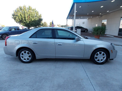 cadillac cts 2004 beige sedan gasoline 6 cylinders rear wheel drive automatic 77099