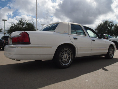 mercury grand marquis 1999 white sedan gs gasoline v8 rear wheel drive automatic 77505