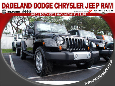 jeep wrangler 2013 black suv unlimited sahara gasoline 6 cylinders 4 wheel drive automatic 33157