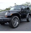 jeep wrangler 2013 black suv freedom edition gasoline 6 cylinders 4 wheel drive automatic 33157