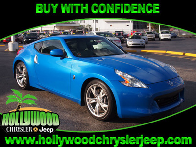 nissan 370z 2009 blue coupe gasoline 6 cylinders rear wheel drive manual 33021