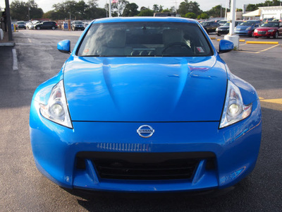 nissan 370z 2009 blue coupe gasoline 6 cylinders rear wheel drive manual 33021