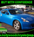 nissan 370z 2009 blue coupe gasoline 6 cylinders rear wheel drive manual 33021