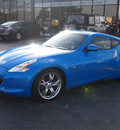 nissan 370z 2009 blue coupe gasoline 6 cylinders rear wheel drive manual 33021