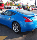 nissan 370z 2009 blue coupe gasoline 6 cylinders rear wheel drive manual 33021