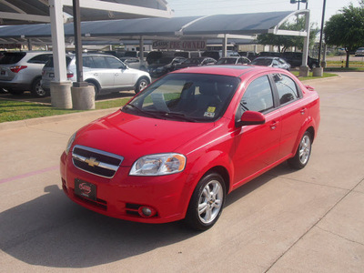 chevrolet aveo 2011 red sedan lt gasoline 4 cylinders front wheel drive automatic 76049