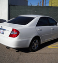 toyota camry 2003 white sedan gasoline 4 cylinders front wheel drive automatic 79925