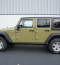 jeep wrangler unlimited 2013 green suv gasoline 6 cylinders 4 wheel drive manual 47130