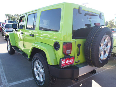 jeep wrangler unlimited 2013 green suv sahara gasoline 6 cylinders 4 wheel drive automatic 77388