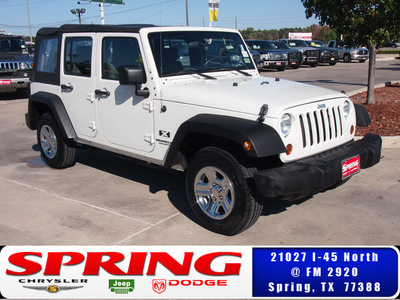 jeep wrangler unlimited 2009 white suv x gasoline 6 cylinders 2 wheel drive automatic 77388