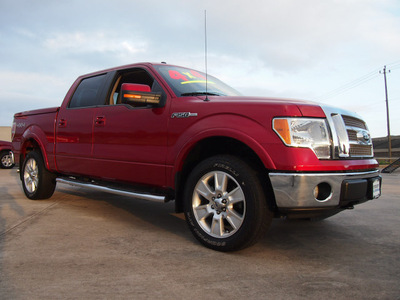 ford f 150 2010 red lariat flex fuel 8 cylinders 4 wheel drive 6 speed automatic 77521