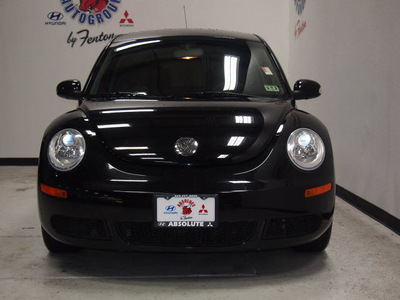 volkswagen new beetle 2010 black hatchback gasoline 5 cylinders front wheel drive automatic 75150