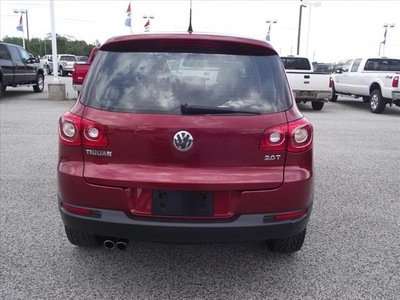 volkswagen tiguan 2010 red suv gasoline 4 cylinders front wheel drive automatic with overdrive 77532