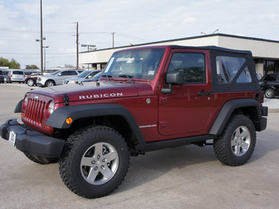 jeep wrangler 2012 red suv rubicon gasoline 6 cylinders 4 wheel drive automatic 76011