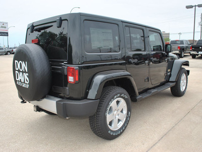 jeep wrangler unlimited 2012 black suv sahara gasoline 6 cylinders 4 wheel drive automatic 76011