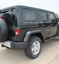 jeep wrangler unlimited 2012 black suv sahara gasoline 6 cylinders 4 wheel drive automatic 76011