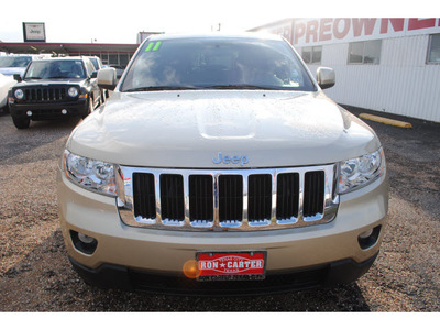 jeep grand cherokee 2011 gold suv laredo gasoline 6 cylinders 2 wheel drive automatic with overdrive 77590