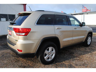 jeep grand cherokee 2011 gold suv laredo gasoline 6 cylinders 2 wheel drive automatic with overdrive 77590