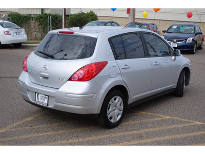 nissan versa 2011 silver hatchback gasoline 4 cylinders front wheel drive automatic 78552