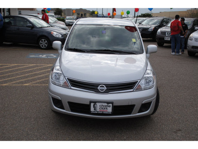 nissan versa 2011 silver hatchback gasoline 4 cylinders front wheel drive automatic 78552