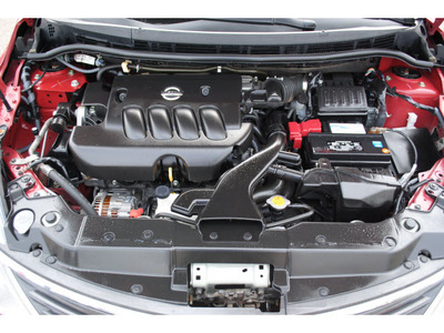 nissan versa 2010 dk  red sedan gasoline 4 cylinders front wheel drive automatic 78552