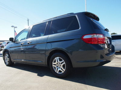 honda odyssey 2006 blue van ex l gasoline 6 cylinders front wheel drive 5 speed automatic 77521