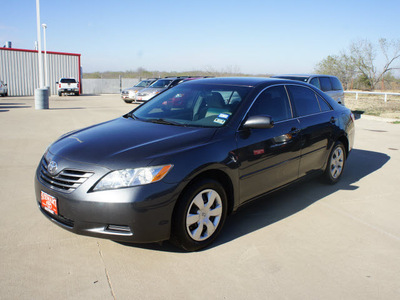 toyota camry 2009 dk  gray sedan le gasoline 4 cylinders front wheel drive automatic 75110