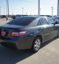 toyota camry 2009 dk  gray sedan le gasoline 4 cylinders front wheel drive automatic 75110