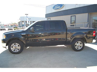 ford f 150 2005 black lariat gasoline 8 cylinders rear wheel drive automatic with overdrive 77706