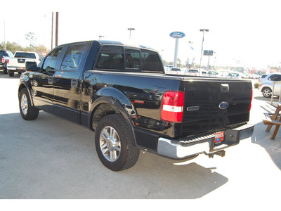 ford f 150 2005 black lariat gasoline 8 cylinders rear wheel drive automatic with overdrive 77706